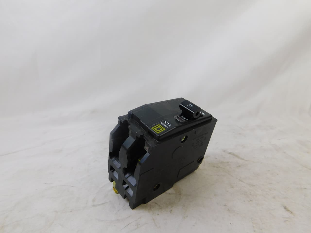 Schneider Electric QOB220 Square D by Schneider Electric QOB220 is a Miniature Circuit Breaker (MCB) designed for bolt-on mounting. It features a rated current of 20A and accommodates a bolt-on connection type. This MCB is compatible with a voltage rating of 48Vdc and 120V/240V AC, supporting a cross-section of 14-8AWG for 1 cable Al/Cu. It is a 2 Pole device with a short circuit breaking rating of 10kA at 240Vac and 5kA at 48Vdc. The terminals are of the press plate type. Schneider Electric QOB220 Square D by Schneider Electric QOB220 is a Miniature Circuit Breaker (MCB) designed for bolt-on mounting. It features a rated current of 20A and accommodates a bolt-on connection type. This MCB is compatible with a voltage rating of 48Vdc and 120V/240V AC, supporting a cross-section of 14-8AWG for 1 cable Al/Cu. It is a 2 Pole device with a short circuit breaking rating of 10kA at 240Vac and 5kA at 48Vdc. The terminals are of the press plate type.