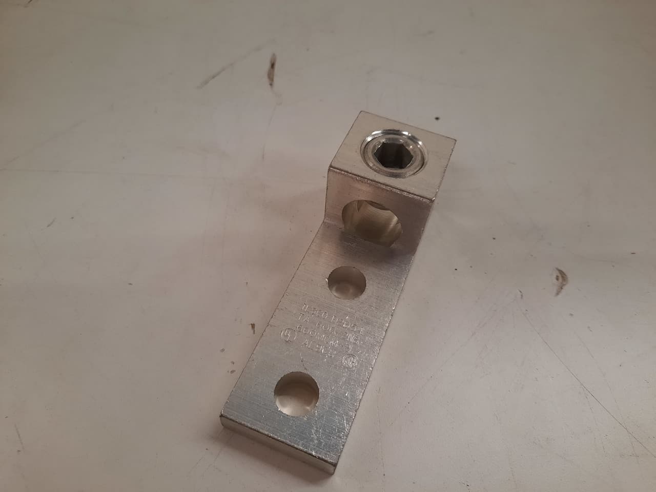 Ilsco TA-600-2NS 1/2" Stud, 4.688" L, 1-3/4" Hole Spacing, 2 AWG to 600 KCMIL Stranded, Silver, Electro Tin Plated Aluminum Alloy, 2-Hole, 1-Conductor, Chamfered Wire Entry, Dual Rated Ilsco TA-600-2NS 1/2" Stud, 4.688" L, 1-3/4" Hole Spacing, 2 AWG to 600 KCMIL Stranded, Silver, Electro Tin Plated Aluminum Alloy, 2-Hole, 1-Conductor, Chamfered Wire Entry, Dual Rated