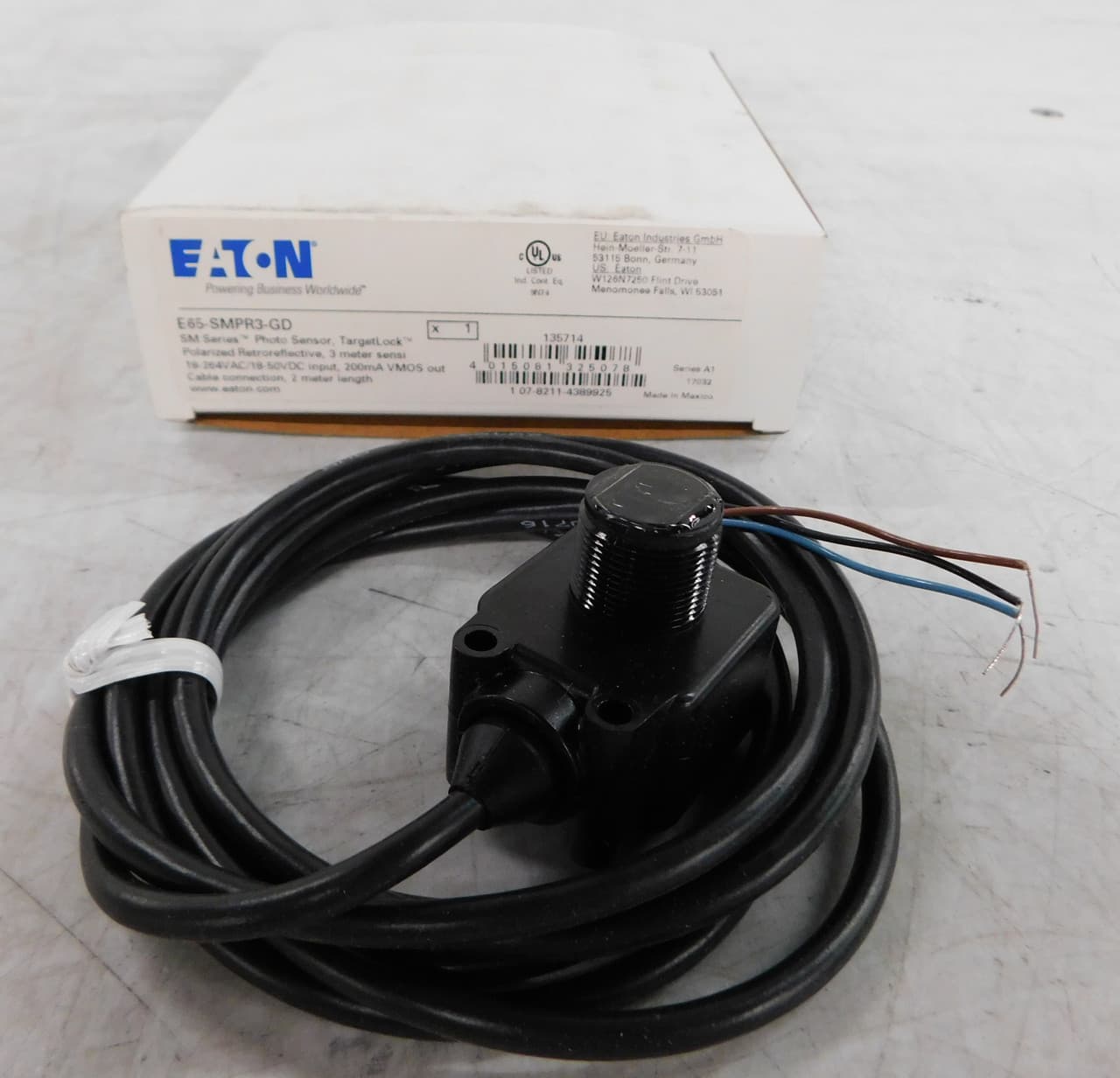 Eaton E65-SMPR3-GD E65-SMPR3-GD Eaton - Eaton SM Series Rectangular Body Photoelectric Sensor, Sensor dist 10 Ft., 200 mA max AC/DC, AC: L1 Switched, DC: NPN Open Collector, 200 mA DC NPN/AC 3-Wire, 6.6 Ft. (2m) Cable, 18–264 Vac/18–50 Vdc input, 6.6 Ft. (2m) Eaton E65-SMPR3-GD E65-SMPR3-GD Eaton - Eaton SM Series Rectangular Body Photoelectric Sensor, Sensor dist 10 Ft., 200 mA max AC/DC, AC: L1 Switched, DC: NPN Open Collector, 200 mA DC NPN/AC 3-Wire, 6.6 Ft. (2m) Cable, 18–264 Vac/18–50 Vdc input, 6.6 Ft. (2m)