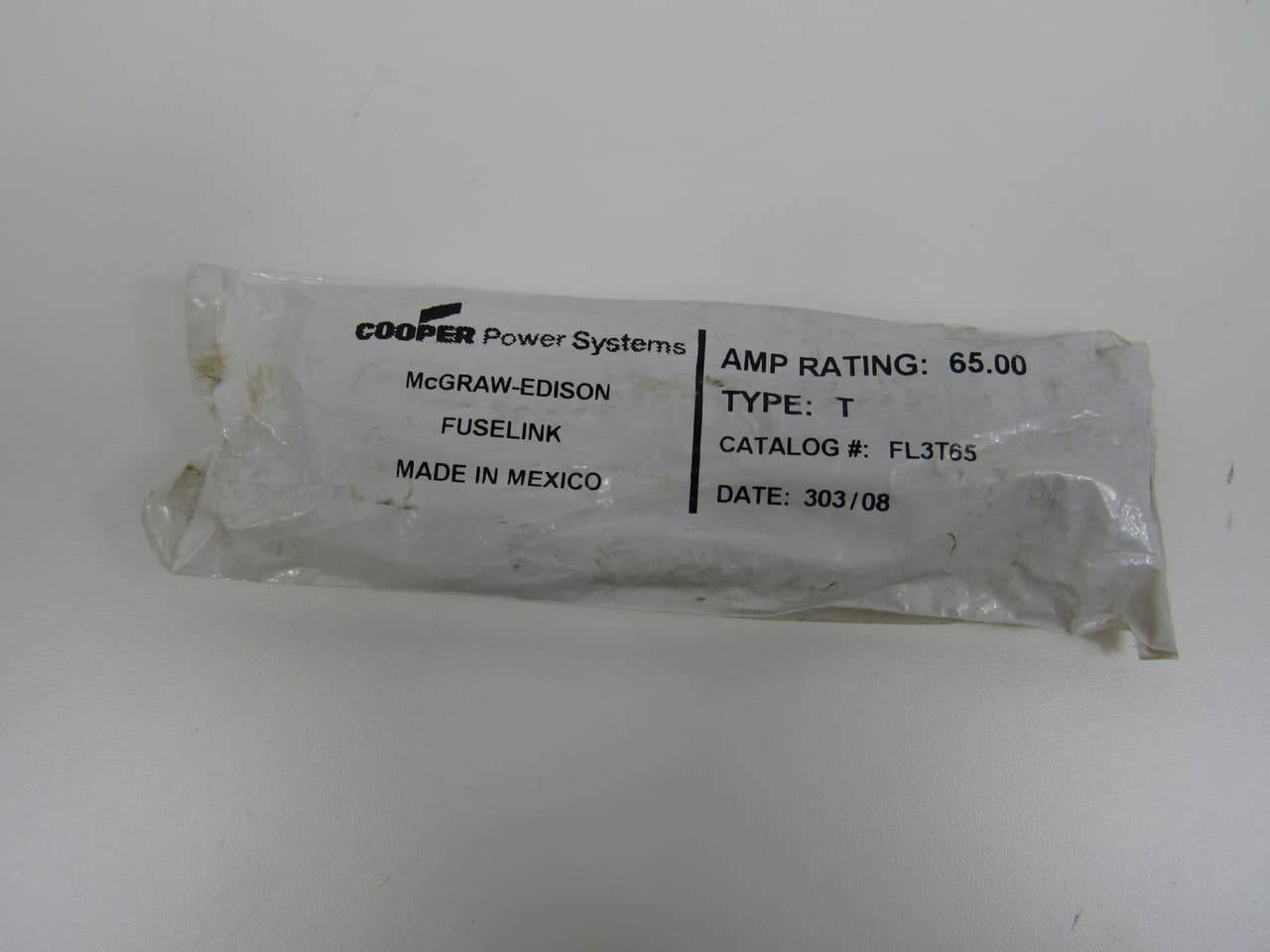 Eaton FL3T65 0.75" x 23", 27 kV, 65 A, EEI-NEMA Cutout Mount, Removable Button Head, Time Delay, Slow Acting, Type T Eaton FL3T65 0.75" x 23", 27 kV, 65 A, EEI-NEMA Cutout Mount, Removable Button Head, Time Delay, Slow Acting, Type T